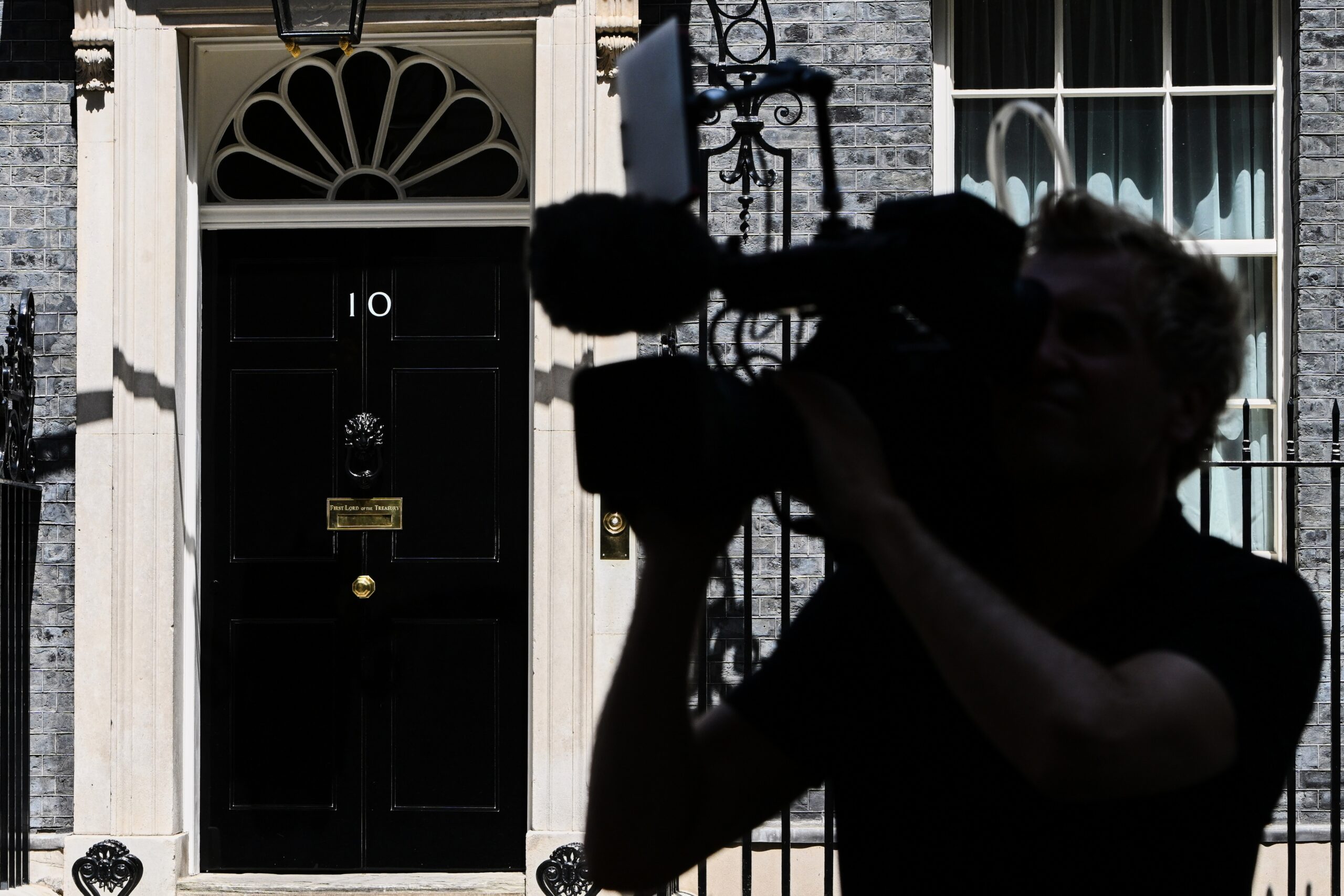 A camera man films the door of 10 Downing Street after Britain's Prime Minister Keir Starmer announced his resignation in London, Monday, June 22, 2026. Photo: Thomas Krych/AP