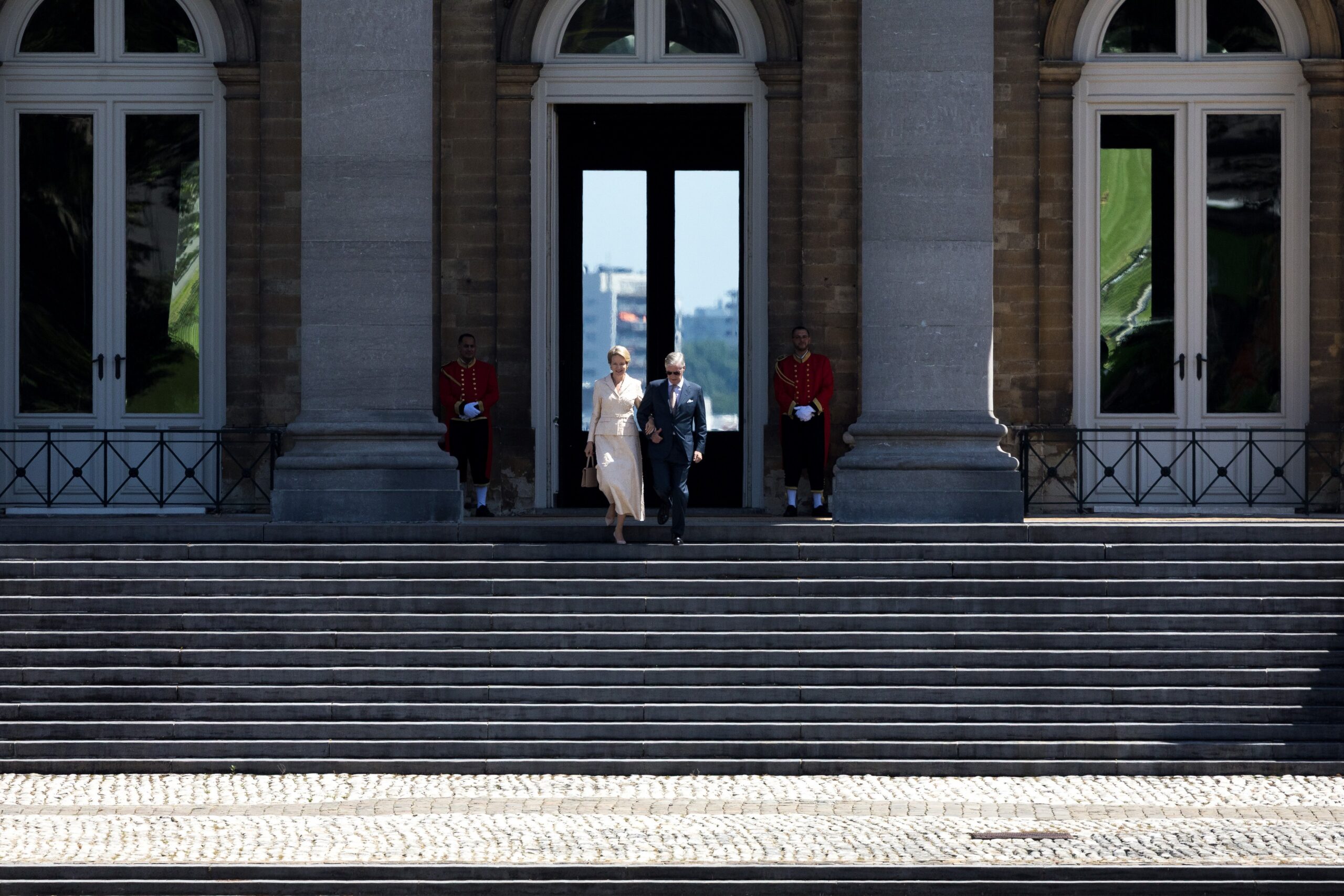 Belgium's King Philippe, right, and Belgium's Queen Mathilde make their way to welcome Japan's Emperor Naruhito and Japan's Empress Masako, as part of a state visit at the Palace of Laeken, in Laeken, Belgium, Monday, June 22, 2026. Photo: Omar Havana/AP