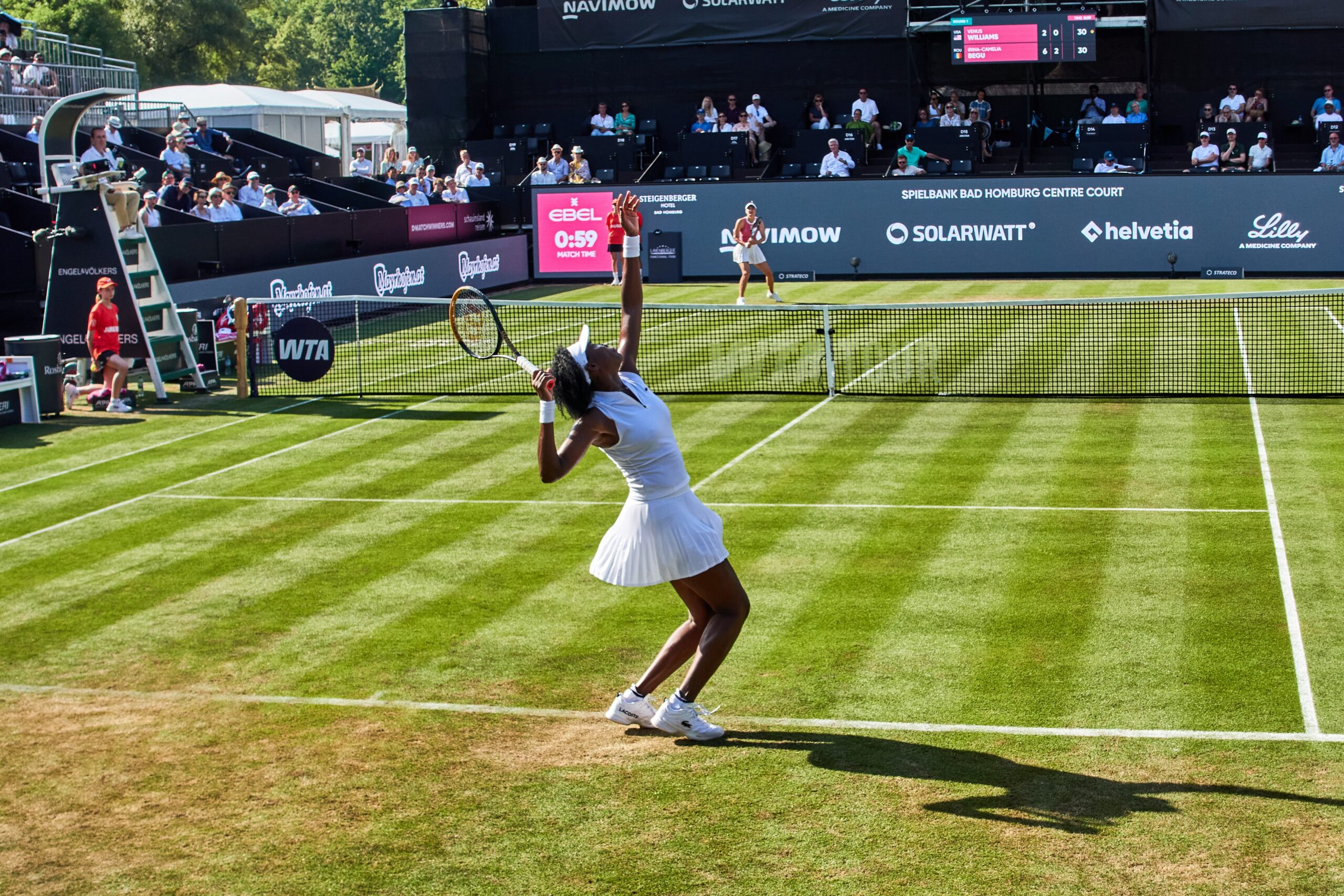 Venus Williams from the US serves against Romania's Irina Camelia Begu during their round of sixteen match at the Bad Homburg Open WTA tennis tournament in Bad Homburg, Germany, Monday, June 22, 2026. Photo: Michael Probst/AP