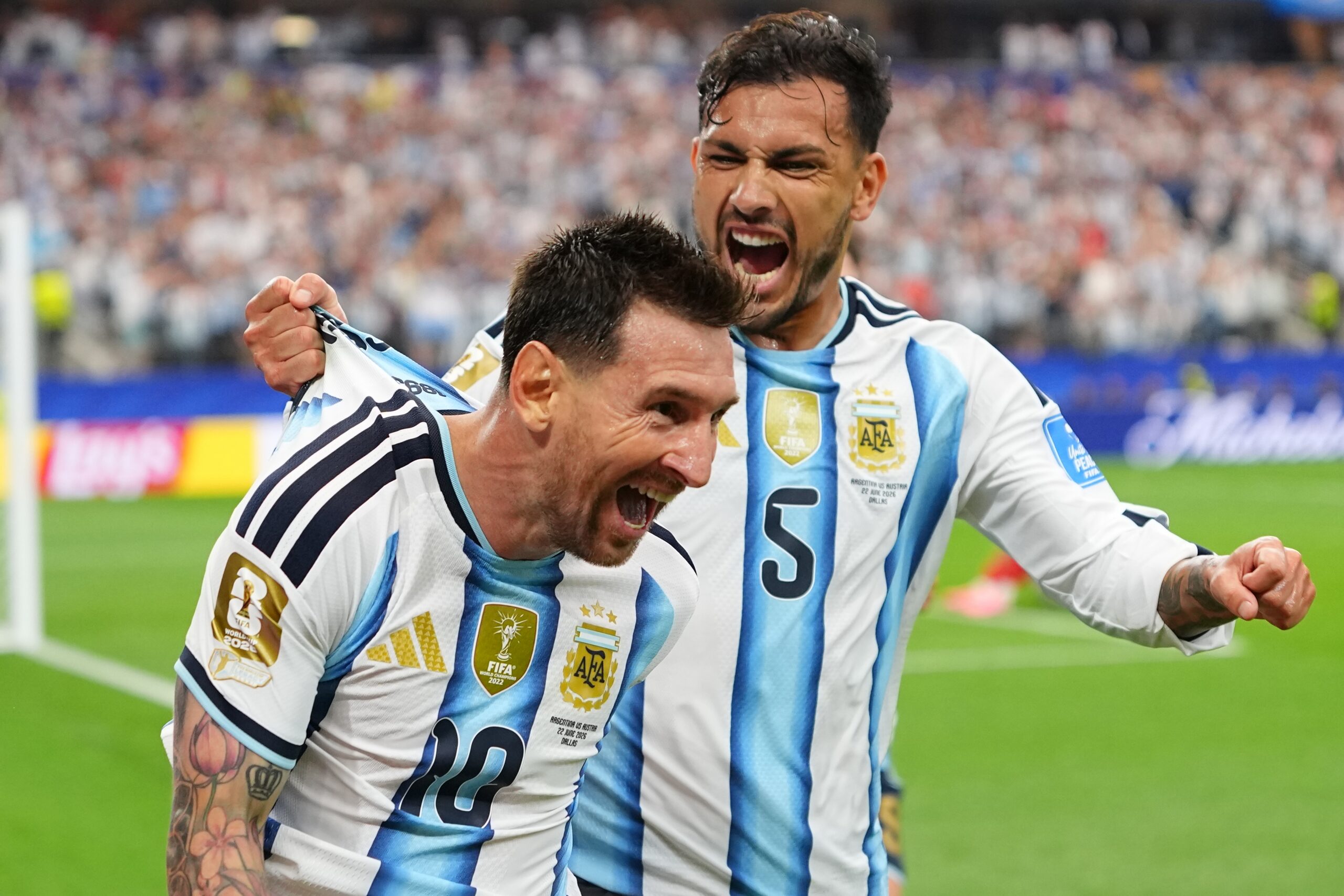 Argentina's Lionel Messi, left, celebrates with Leandro Paredes after scoring his side's second goal during the World Cup Group J soccer match between Argentina and Austria in Arlington, Texas, near Dallas, Monday, June 22, 2026. Photo: Julio Cortez/AP