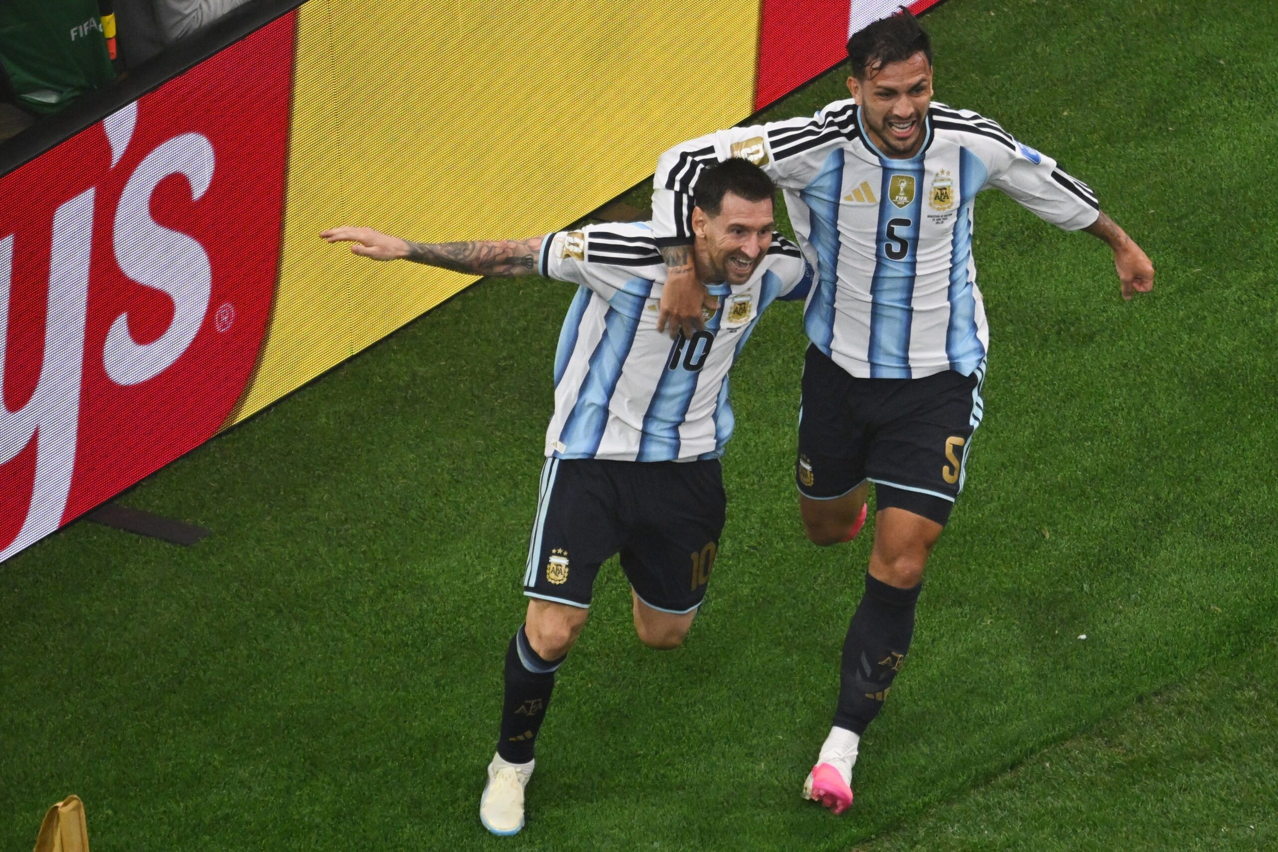 Argentina's Lionel Messi, left, is congratulated by Leandro Paredes after scored during the World Cup Group J soccer match between Argentina and Austria in Arlington, Texas, near Dallas, Monday, June 22, 2026. Photo: Jessica Tobias/AP