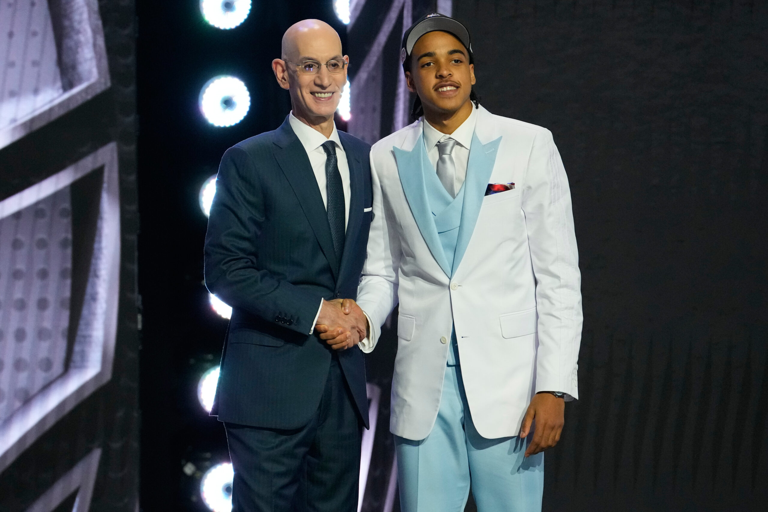 Mikel Brown Jr. gets his welcome to Brooklyn from NBA Commissioner Adam Silver after being selected sixth overall by the Nets at Downtown’s Barclays Center on Tuesday. Photo: Yuki Iwamura/AP