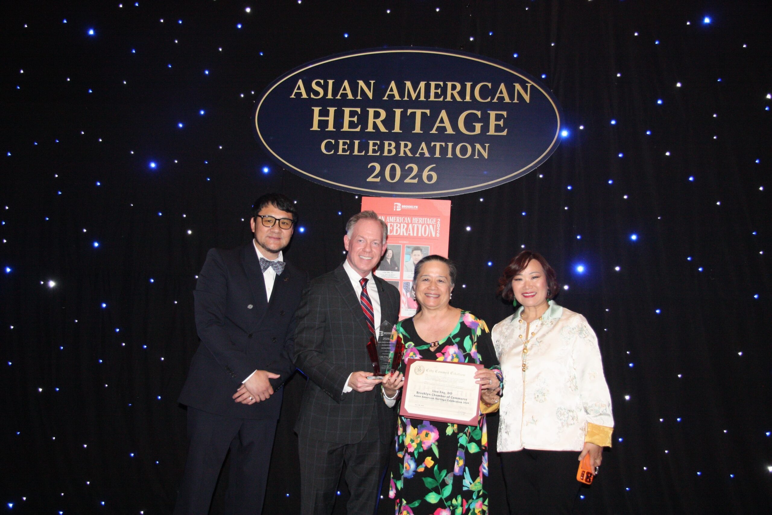 Lisa Eng, DO, receives her award. Photo: Arthur De Gaeta/Eagle Urban Media