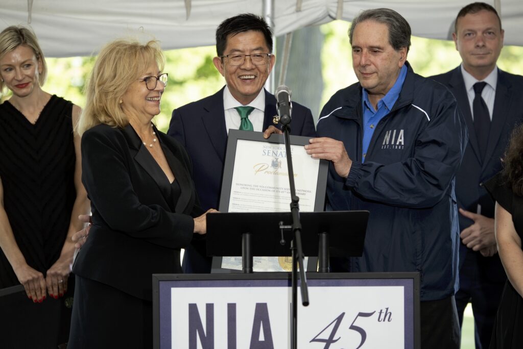 State Sen. Steve Chan presents a proclamation that honors NIA’s 45th anniversary. Photo: NIA