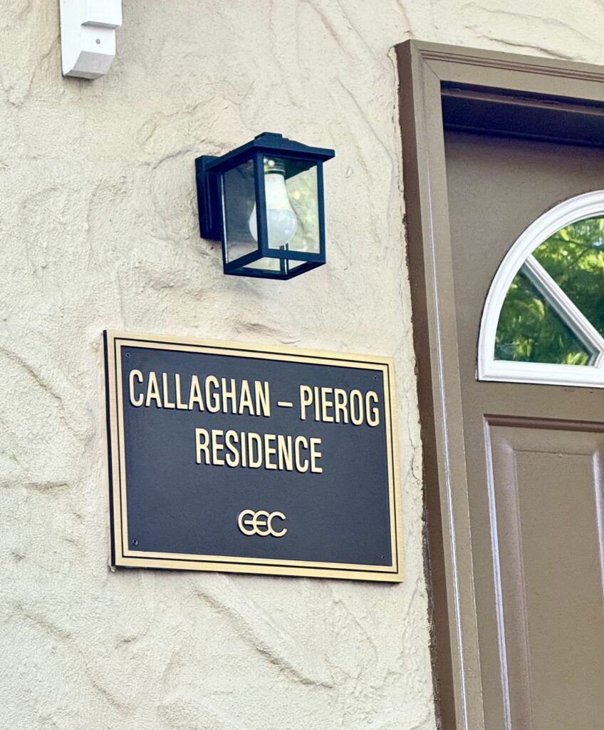 The unveiling of the Callaghan-Pierog Residence sign. Photo: Arthur De Gaeta/Brooklyn Eagle