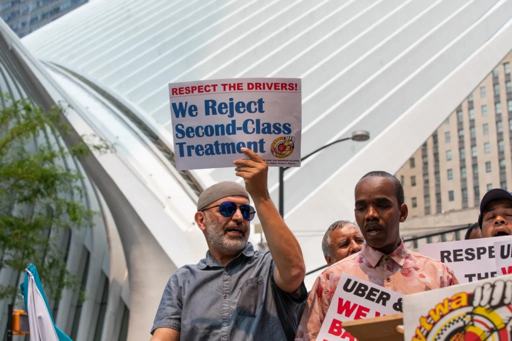 Uber and Lyft drivers protest outside Uber's headquarters in Lower Manhattan against what they described as unfair account deactivations, July 14, 2026. Credit: Ben Fractenberg/The City Reporter