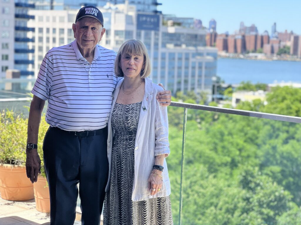 Norman Brodsky and his wife, Elaine, on the balcony of their Williamsburg office. Photo: Wayne Daren Schneiderman/Brooklyn Eagle