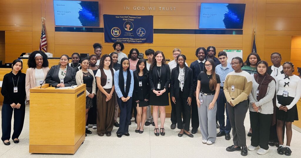 Professor and Senior Principal Law Clerk Victoria Rosner, center, alongside 2026 Izetta Johnson interns. Photo: Wayne Daren Schneiderman/Brooklyn Eagle