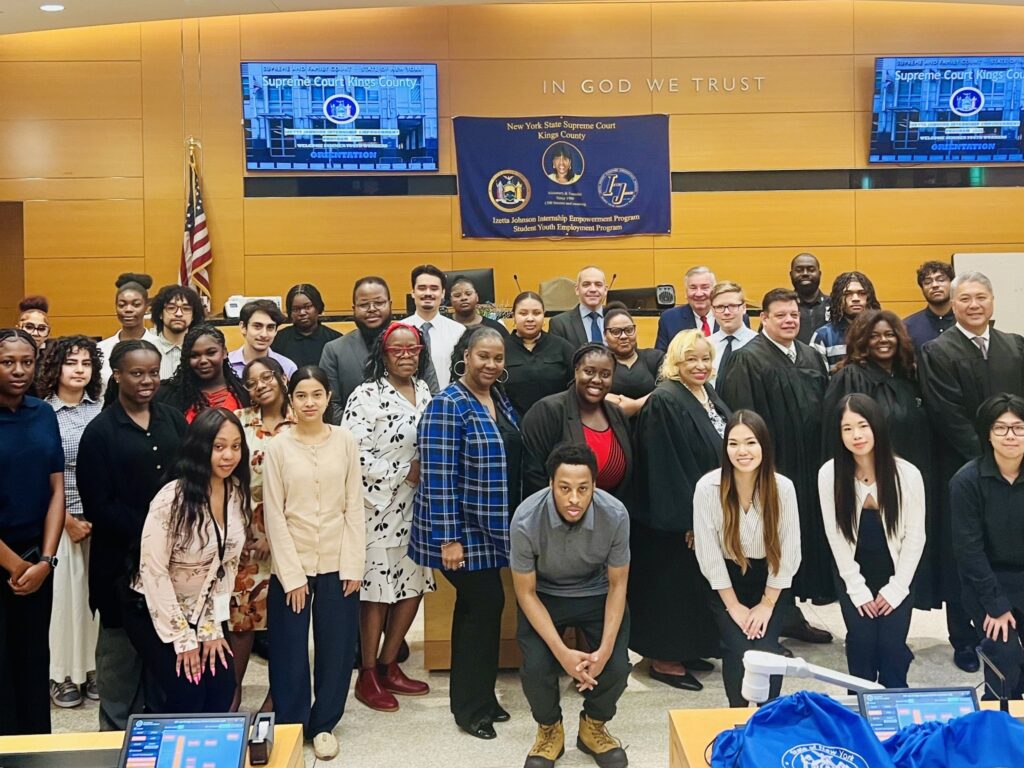 Members of the Izetta Johnson Summer Youth Employment Program Committee, interns and judges of the Unified Court System. Photo: Wayne Daren Schneiderman/Brooklyn Eagle