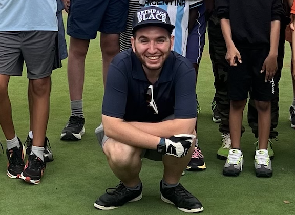 Evan Koutsopetras, center, is a lead coach at City Parks Foundation's Junior Golf Center’s new Adaptive Sports Program. Photo: City Parks Foundation