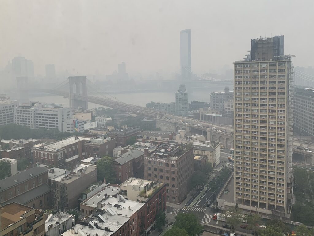 The Brooklyn Bridge fades into the haze from Canadian wildfires, and Manhattan could barely be seen across the East River on Thursday and Friday. Photo: Mary Frost/Brooklyn Eagle
